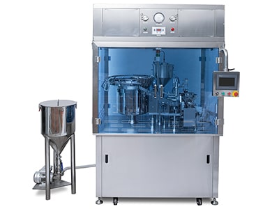 Filling and capping machine for prefilled plastic syringes